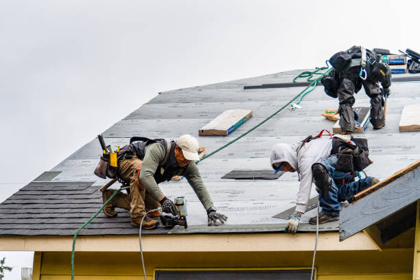 Professional Roofing technician working in Salfordville, PA